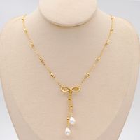 304 Stainless Steel Freshwater Pearl Gold Plated Casual Vintage Style Simple Style Infinity Bow Knot Pendant Necklace main image 4