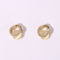1 Pair Sweet Simple Style Shiny Oval Hollow Out Inlay Alloy Artificial Rhinestones Resin Gold Plated Ear Studs main image 1