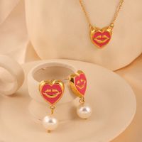 304 Stainless Steel Artificial Pearl 18K Gold Plated Simple Style Artistic Enamel Plating Inlay Lips Round Heart Shape Artificial Pearls Earrings Necklace main image 3