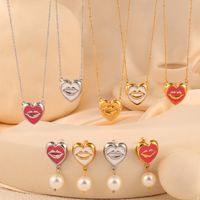 304 Stainless Steel Artificial Pearl 18K Gold Plated Simple Style Artistic Enamel Plating Inlay Lips Round Heart Shape Artificial Pearls Earrings Necklace main image 1