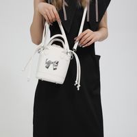 Women's Pu Leather Solid Color Bow Knot Punk Sewing Thread String Handbag Bucket Bag sku image 3