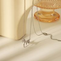 304 Stainless Steel Copper 18K Gold Plated Casual Simple Style Inlay Bow Knot Zircon Pendant Necklace main image 4