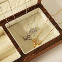 304 Stainless Steel Copper 18K Gold Plated Casual Simple Style Inlay Bow Knot Zircon Pendant Necklace main image 1