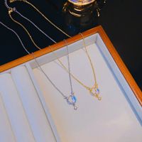 304 Stainless Steel Copper 18K Gold Plated K Gold Plated Elegant Shiny Hollow Out Inlay Star Moon Zircon Pendant Necklace main image 6