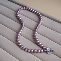 Bijoux En Gros Élégant Rond Perle Artificielle Le Cuivre Zircon Perlé Évider Incruster Collier main image 5