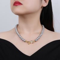 Bijoux En Gros Élégant Glamour Noeud D'Arc Perle Artificielle Le Cuivre Zircon Incruster Collier main image 9