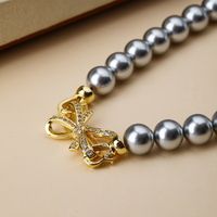 Großhandel Schmuck Elegant Glam Bogenknoten Künstliche Perle Kupfer Zirkon Inlay Halskette main image 5