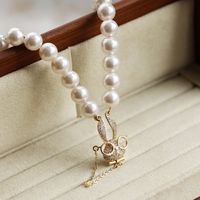 Wholesale Jewelry Elegant Cute Rabbit Artificial Pearl Copper Zircon Beaded Chain Inlay Pendant Necklace main image 1