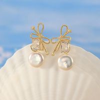 1 Pair Baroque Style Sweet Simple Style Bow Knot Plating Inlay Freshwater Pearl Sterling Silver Freshwater Pearl Zircon Drop Earrings main image 1