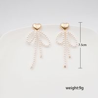 1 Pair Vintage Style Ethnic Style Heart Shape Bow Knot Beaded Plating Imitation Pearl Copper Gold Plated Drop Earrings main image 4