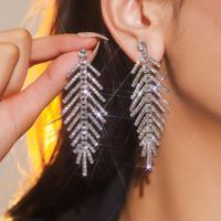 1 Paire Style Simple Style Classique Couleur Unie Incruster Alliage De Cuivre Strass Boucles D'oreilles main image 1