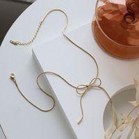 304 Stainless Steel 18K Gold Plated IG Style Simple Style Commute Bow Knot Pendant Necklace main image 4