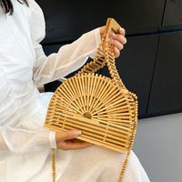 Women's Medium Bamboo Weaving Solid Color Vacation Classic Style Hollow Semicircle Magnetic Buckle Crossbody Bag main image 9