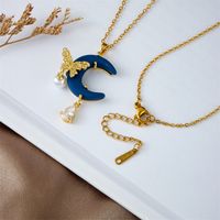 Copper Gold Plated Elegant Lady Classic Style Plating Inlay Star Moon Bow Knot Artificial Pearls Rhinestones Pendant Necklace main image 3