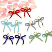 1 Pair Simple Style Bow Knot Plating Artificial Crystal Copper 18K Gold Plated Earrings main image 1