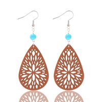 1 Pair Vintage Style Ethnic Style Simple Style Water Droplets Beaded Hollow Out Wood Drop Earrings main image 4