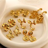 1 Pair Elegant Streetwear Bow Knot Plating Copper Ear Studs main image 1