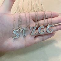Wholesale Elegant Shiny Letter 304 Stainless Steel Copper Three-dimensional Inlay K Gold Plated Zircon Pendant Necklace main image 1
