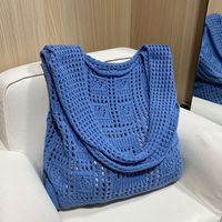 Women's Medium Knit Solid Color Basic Hollow Bucket Open Shoulder Bag main image 1