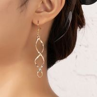 1 Pair Elegant Classic Style Tassel Side Stripe Hollow Out Alloy Drop Earrings main image 1