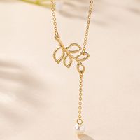 Wholesale Jewelry Vacation Simple Style Leaves Plastic Zinc Alloy Pearl Hollow Out Pendant Necklace main image 4