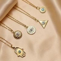 Wholesale IG Style Classic Style Triangle Palm Eye Copper Inlay 18K Gold Plated Natural Stone Zircon Pendant Necklace main image 1