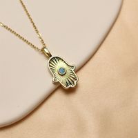 Wholesale IG Style Classic Style Triangle Palm Eye Copper Inlay 18K Gold Plated Natural Stone Zircon Pendant Necklace main image 4