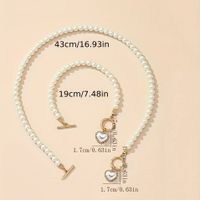 Alloy Elegant Lady Bohemian Inlay Heart Shape Artificial Pearls Zircon Bracelets Necklace main image 2