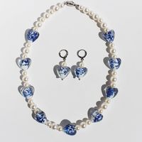 IG Style Elegant Heart Shape Flower Artificial Pearl Glass Brass Beaded Women's Earrings Necklace main image 1