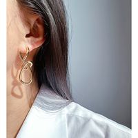 1 Pair Exaggerated Knot Asymmetrical Brass 18K Gold Plated Ear Studs main image 4
