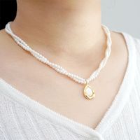 Casual Vintage Style Beach Round Imitation Pearl Copper Beaded Plating Shell Gold Plated Women's Double Layer Necklaces main image 1