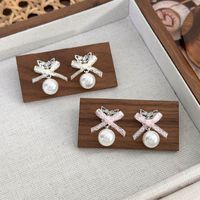 1 Pair Sweet Simple Style Bow Knot Inlay Alloy Pearl Drop Earrings main image 5