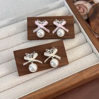 1 Pair Sweet Simple Style Bow Knot Inlay Alloy Pearl Drop Earrings main image 8