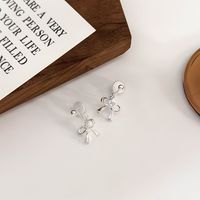 1 Pair Simple Style Classic Style Bow Knot Inlay Copper Rhinestones Drop Earrings main image 1