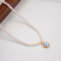 Basic Modern Style Classic Style Oval Imitation Pearl Copper Inlay Artificial Rhinestones Glass Gold Plated Women's Pendant Necklace main image 5