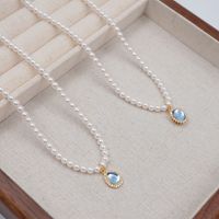 Basic Modern Style Classic Style Oval Imitation Pearl Copper Inlay Artificial Rhinestones Glass Gold Plated Women's Pendant Necklace main image 4
