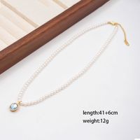 Basic Modern Style Classic Style Oval Imitation Pearl Copper Inlay Artificial Rhinestones Glass Gold Plated Women's Pendant Necklace main image 2