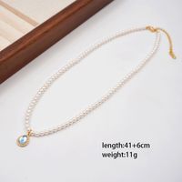 Simple Style Commute Oval Water Droplets Imitation Pearl Glass Copper Handmade Rhinestones Glass Gold Plated Women's Pendant Necklace main image 5