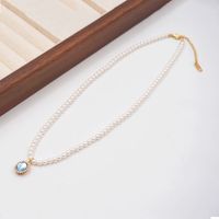 Basic Modern Style Classic Style Oval Imitation Pearl Copper Inlay Artificial Rhinestones Glass Gold Plated Women's Pendant Necklace main image 1