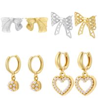 1 Pair IG Style Basic Classic Style Round Heart Shape Bow Knot Plating Inlay Copper Artificial Pearls Zircon 18K Gold Plated Drop Earrings main image 1