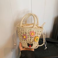 Women's Medium Straw Solid Color Flower Vacation Beach Weave Bucket String Straw Bag main image 3