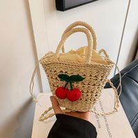 Women's Medium Straw Solid Color Flower Vacation Beach Weave Bucket String Straw Bag main image 2