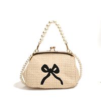 Women's Medium Straw Solid Color Bow Knot Vacation Beach Beading Clasp Frame Crossbody Bag sku image 2