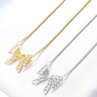 Wholesale Sweet Bow Knot Copper Hollow Out 18K Gold Plated Zircon Pendant Necklace main image 1
