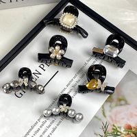Women's Cute Sweet Simple Style Letter Flower Bow Knot Artificial Crystal Synthetic Resin Inlay Artificial Crystal Artificial Rhinestones Hair Clip main image 1