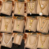 316L Stainless Steel  18K Gold Plated Vintage Style Commute Plating Inlay Devil's Eye Heart Shape Lock Turquoise Rhinestones Pearl Layered Necklaces main image 1