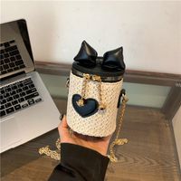 Women's Small Straw Heart Shape Solid Color Cute Basic Bowknot Cylindrical Zipper Crossbody Bag main image 6