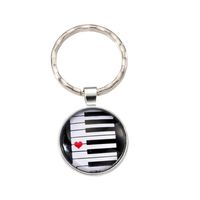 Modern Style Classic Style Round Pano Keys Alloy Glass Casting Bag Pendant Keychain main image 3