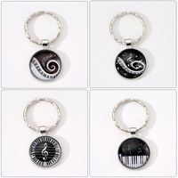 Classic Style Commute Pano Keys Notes Alloy Glass Casting Bag Pendant Keychain main image 4