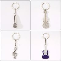 Modern Style Simple Style Guitar Microphone Notes Alloy Plating Bag Pendant Keychain main image 5